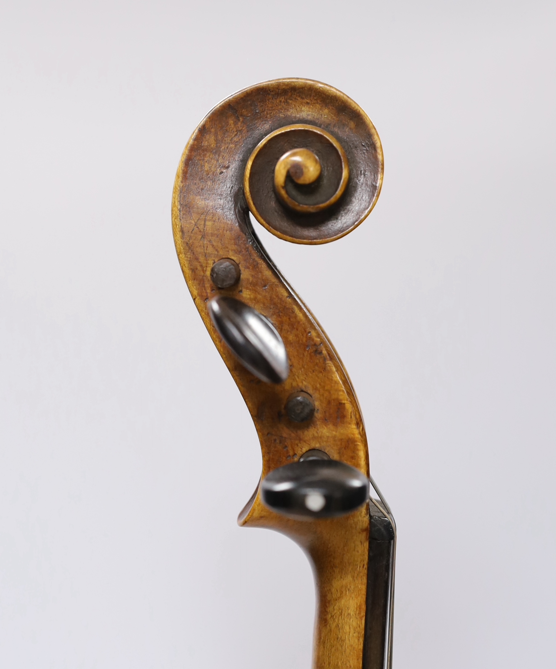 An early 20th century English violin stamped Norman Duke, London, one piece back with wax seal, cased, violin 60cm long